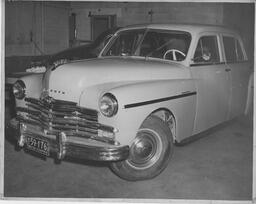 Plymouth Special Deluxe car in body shop, ca. 1949