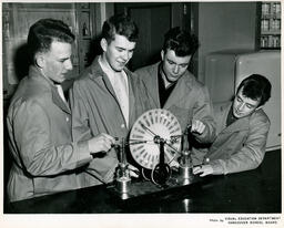 Students using a Wimshurst electrostatic generator, ca. 1962