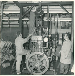 Student and instructor with chain block hoist