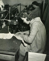 Student at sewing machine
