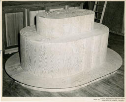 Tiered oval wooden structure, ca. 1951