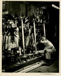 Engineering student with a steam engine