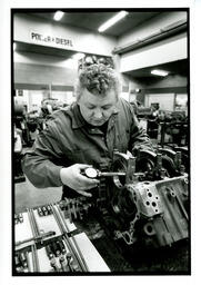 Student working on machine