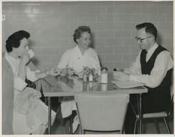 Three people having coffee