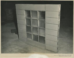 Stone wall with decorative glass, ca. 1955