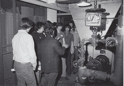 Students on a tour of an industrial building