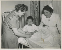 Practical Nursing students attending to young child