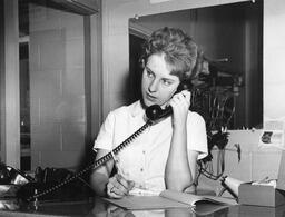 Student answering a phone