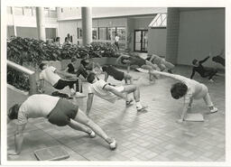 Stretching in City Centre campus foyer