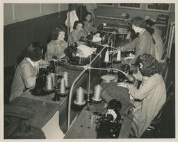 Class of Power Sewing students working at sewing machines