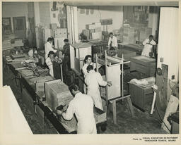 Students working on carpentry projects in a classroom, ca. 1960