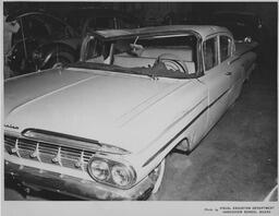 Car with a dented roof, ca. 1959