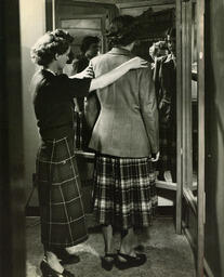 Person being fitted by a tailoring student