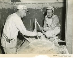 Plastering students working on project, ca. 1955