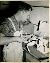 Student working with a lathe, ca. 1950
