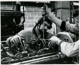 Student working on engine, ca. 1975