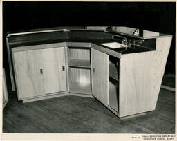Wooden kitchen cabinets, ca. 1954