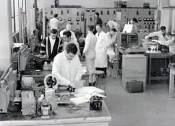 Students working on various electronics