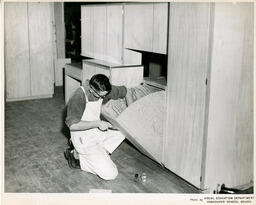 Student building drawer, ca. 1954