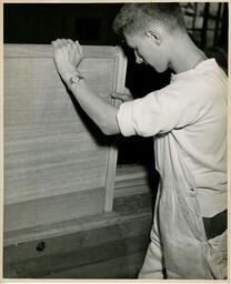 Student working on a woodworking project, ca. 1950