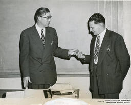 Administrators in a classroom, ca. 1955