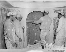 Plastering students working on an arch, ca. 1955