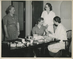 Nursing student getting an injection