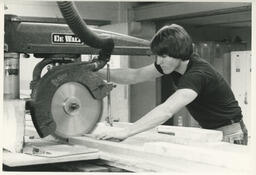 Student using circular saw, ca. 1976