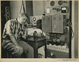 Navigation student using a receiver, ca. 1959