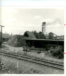 Building by train tracks