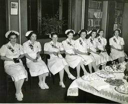 Graduating nursing students sitting in a row
