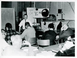 Instructor teaching a group of students