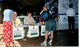 People at a table at the Go Green at VCC event