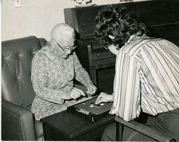 Two people playing a board game
