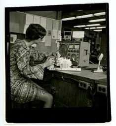 Student works on an electronic device