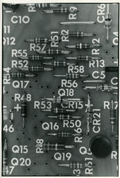 Close up of a circuit board and capacitors