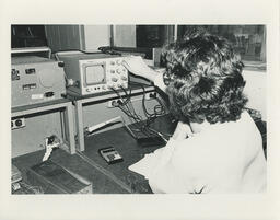 Student using an oscilloscope
