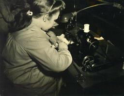 Student working at sewing machine