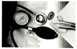 Stethescope, practical nurse pin, dental tools montage