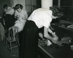 Tailoring students working in a classroom