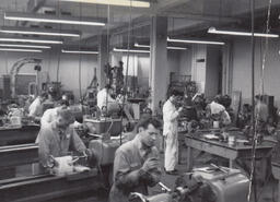 Students in a classroom machine shop