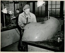 Student working on car part, ca. 1949