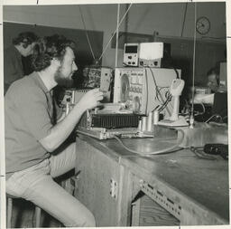 Student working with radio equipment
