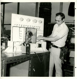 Student using electrical measuring instrument