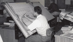 Student at a drafting table