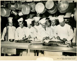 Students practice knife skills, ca. 1960