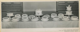 Table display of cakes, ca. 1951
