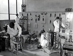 Students working in an electronics workshop, ca. 1962