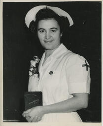 Nursing Student holding a diploma