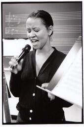 Student singing into microphone